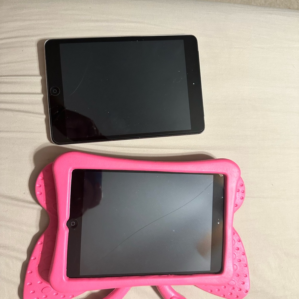 2 iPad minis 1st gen.